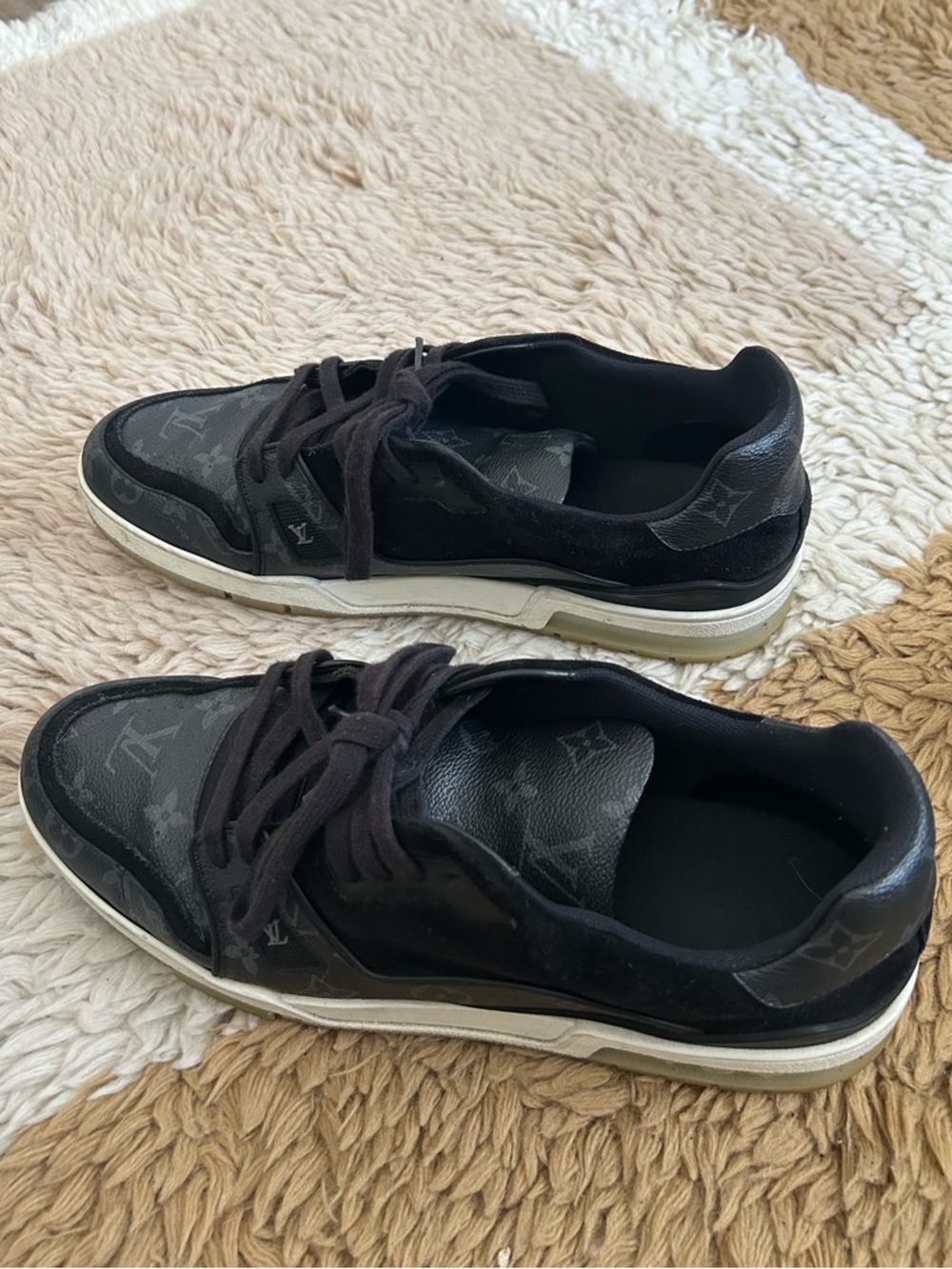 Louis Vuitton LV Trainer sneakers in a black Monogram canvas and leather design
